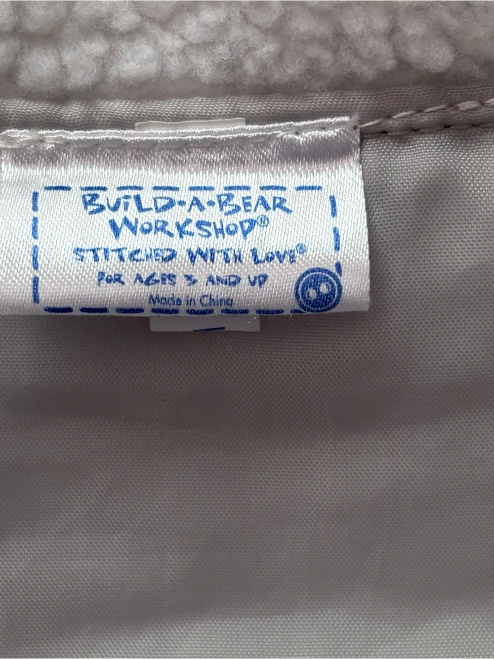 Build-A-Bear camouflage puffer jacket